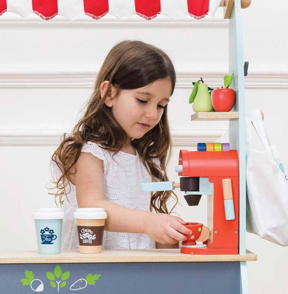 TV299-cafe-machine-barista-red-cups-coffee-pods-and-spoon-child.jpg
